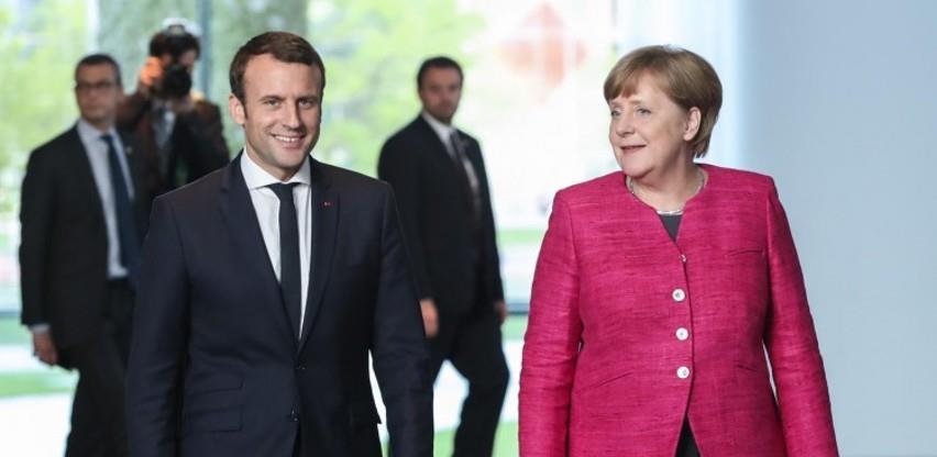 Građani EU: Merkel popularnija od Macrona